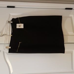 NWT Calvin Klein size 12 black skirt gold zipper detail 24 length